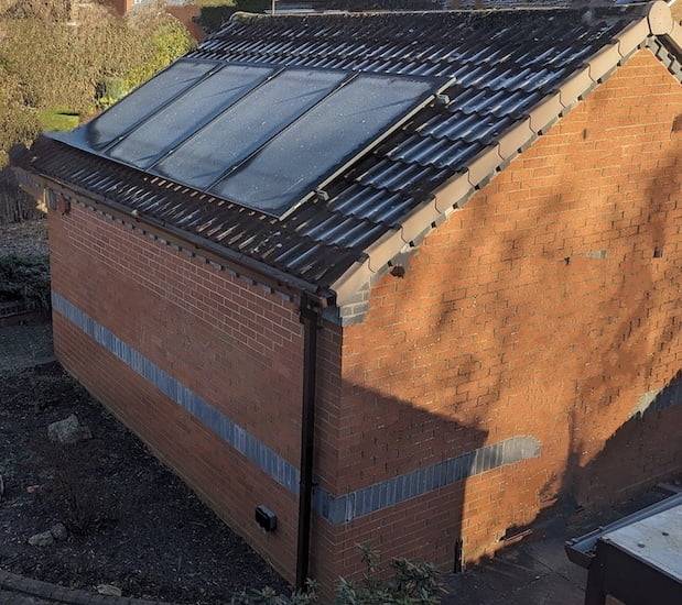 Solar panels with light frosting during winter.
